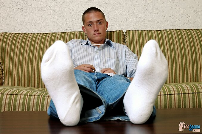 Seth Evans shows off his socks and feet