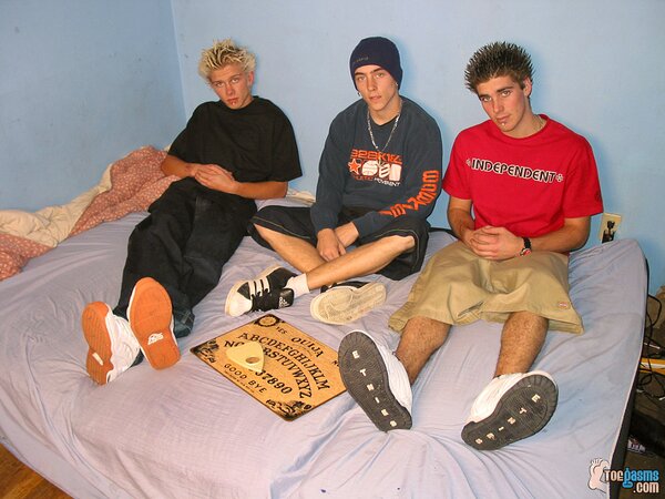 Ian Madrox, Kelly Cooper and Evan Heinze shows off their sneakers and socks