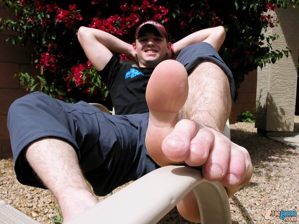 Jeremiah Johnson shows off his socks and feet