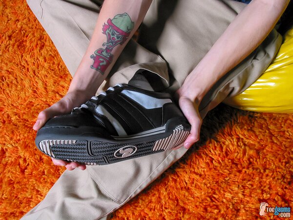 Ian Madrox shows off his sneakers and socks