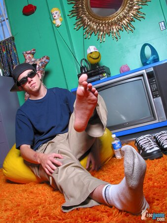 Ian Madrox shows off his sneakers and socks