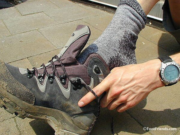 Mr. Gay London shows off his socks and feet