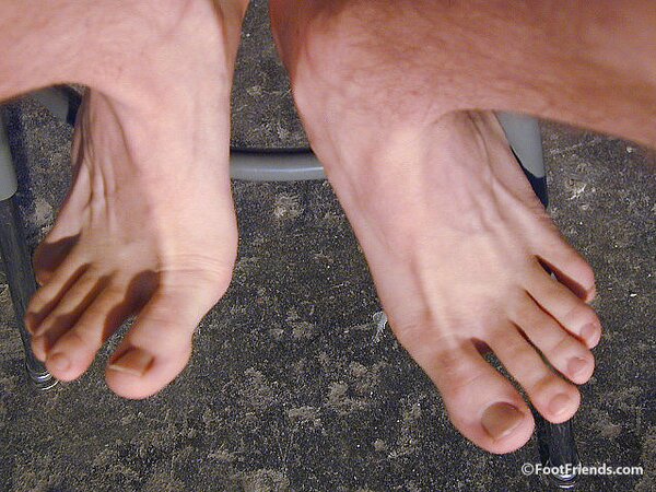 Rusty Rodes shows off his feet and body