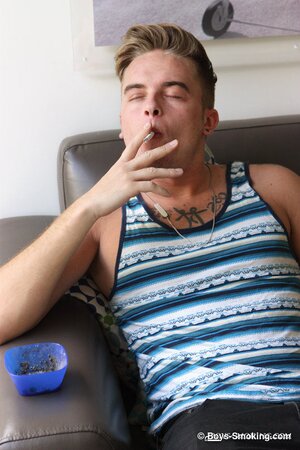 Felix Warner smokes and strokes his hard cock!