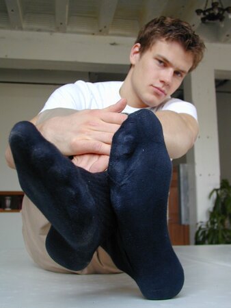 Andre displays his big, beautiful feet in sexy socks