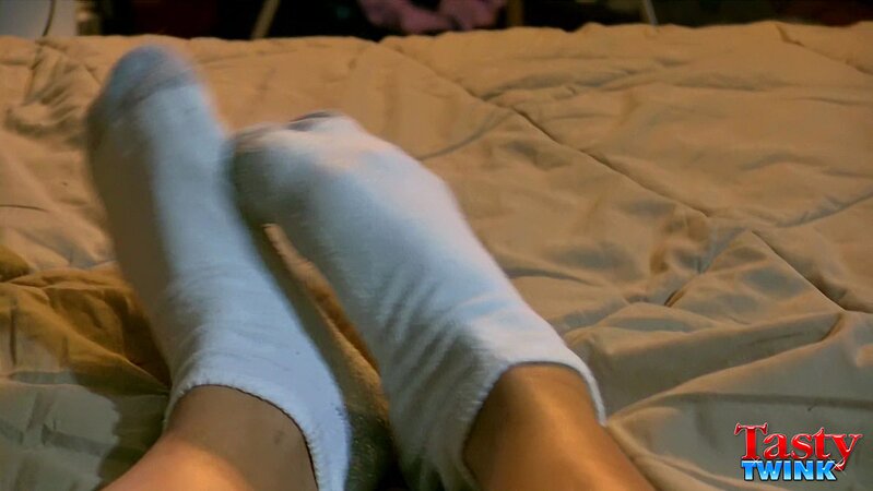 Brunette twink Angel flaunts his feet in white socks