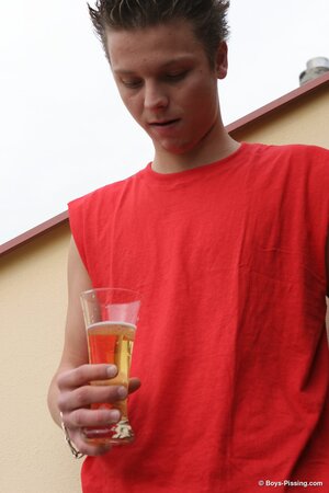 Young twink Stone drinks his own warm urine