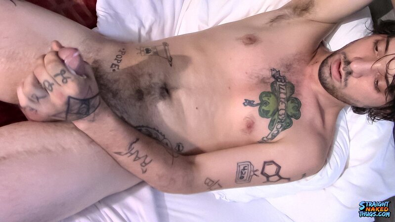 Tattooed twink Chad Turner shows off his bare feet while jacking off