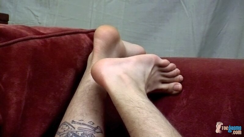 Bryce Corbin uses his feet to make friend Chris Porter cum