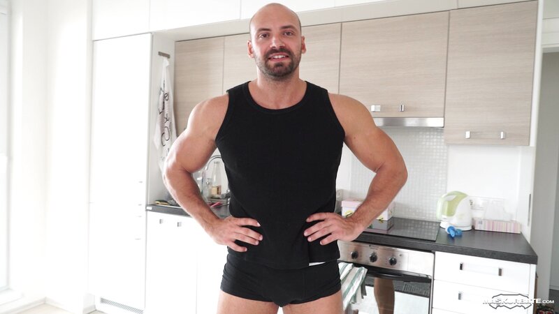 Bald muscle hunk Thomas Friedl showcases his jerking skills