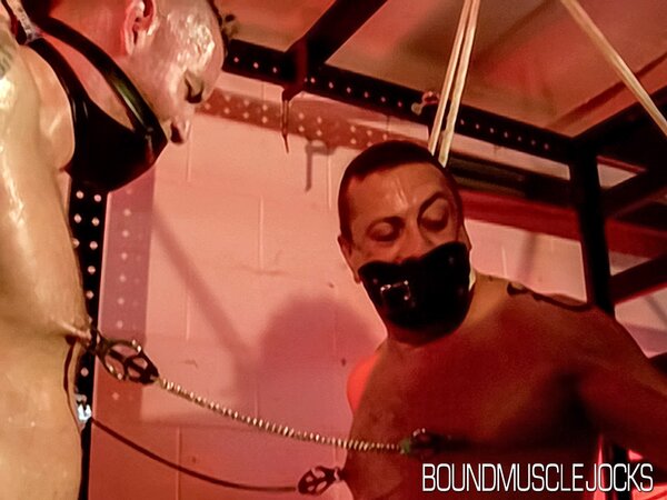 Bigg Pete and Dominik Mann are gagged and roped up