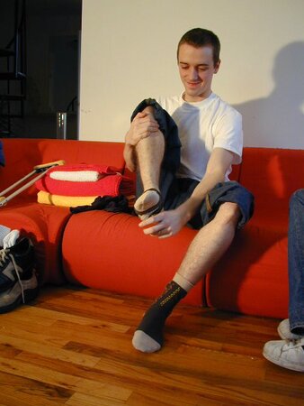 Aaron tries on various socks from the vault