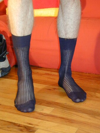 Aaron tries on various socks from the vault