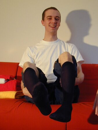 Aaron tries on various socks from the vault