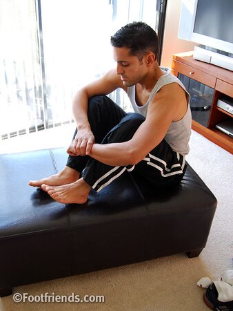 Petite hunk Andre poses solo in his favorite athletic socks for the fans