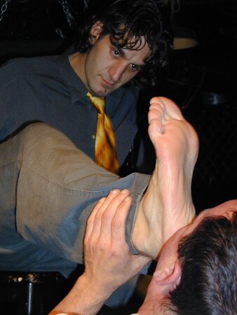 Brunette Mat shows off his meaty hands and feet