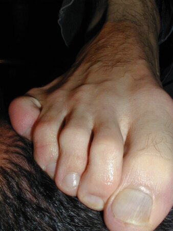 Brunette Mat shows off his meaty hands and feet