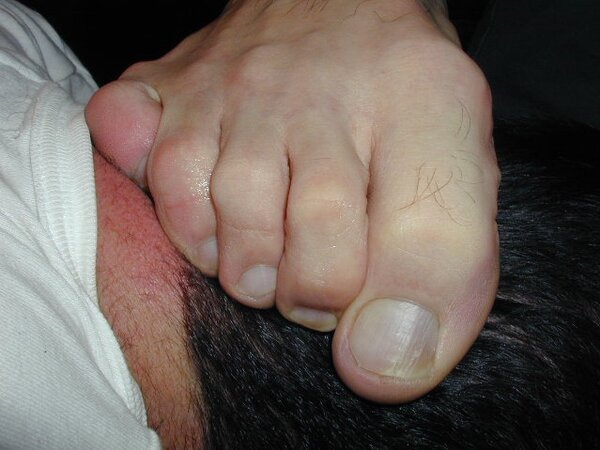 Brunette Mat shows off his meaty hands and feet