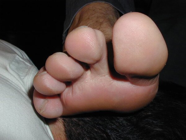 Brunette Mat shows off his meaty hands and feet