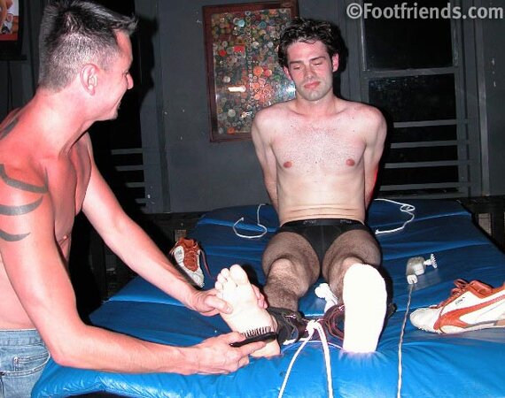 Andrew enjoys tickling sweet Christopher's smooth feet and body