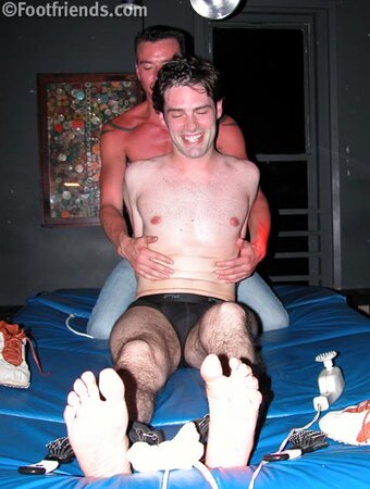 Andrew enjoys tickling sweet Christopher's smooth feet and body