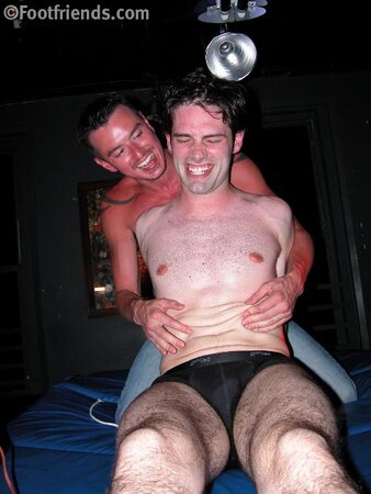 Andrew enjoys tickling sweet Christopher's smooth feet and body