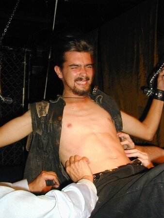 Biker Boy submits to tickling torture for cash