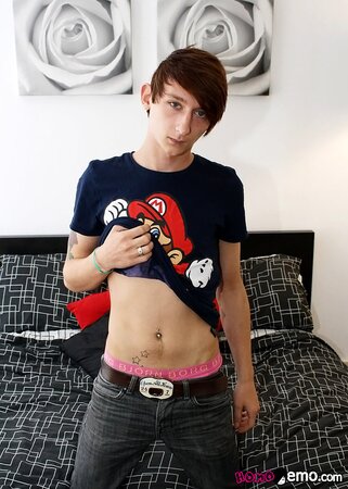 Cute emo boy Max Brown shows off his big uncut cock and jerks it hard