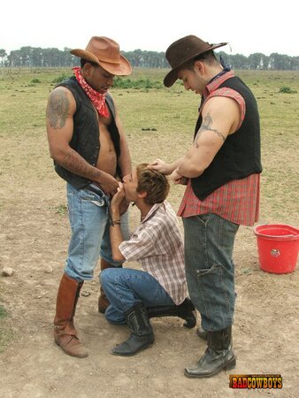 Guy taking black and white cowboys` cocks